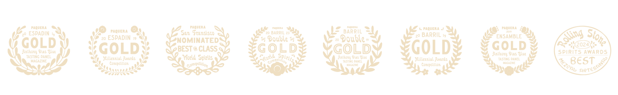 A collection of award badges for Paquera Mezcal, displayed in a horizontal row. The badges include gold and double gold awards from various spirits competitions, including tasting panels and the San Francisco World Spirits Competition. The final badge on the right features the Rolling Stone 2024 Spirits Awards, recognizing Paquera Mezcal as the best in the Mezcal Artesanal category.